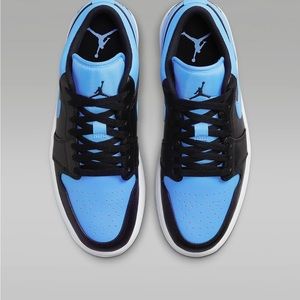 Michael Jordan Carolina blue , black and white Jordan low ones